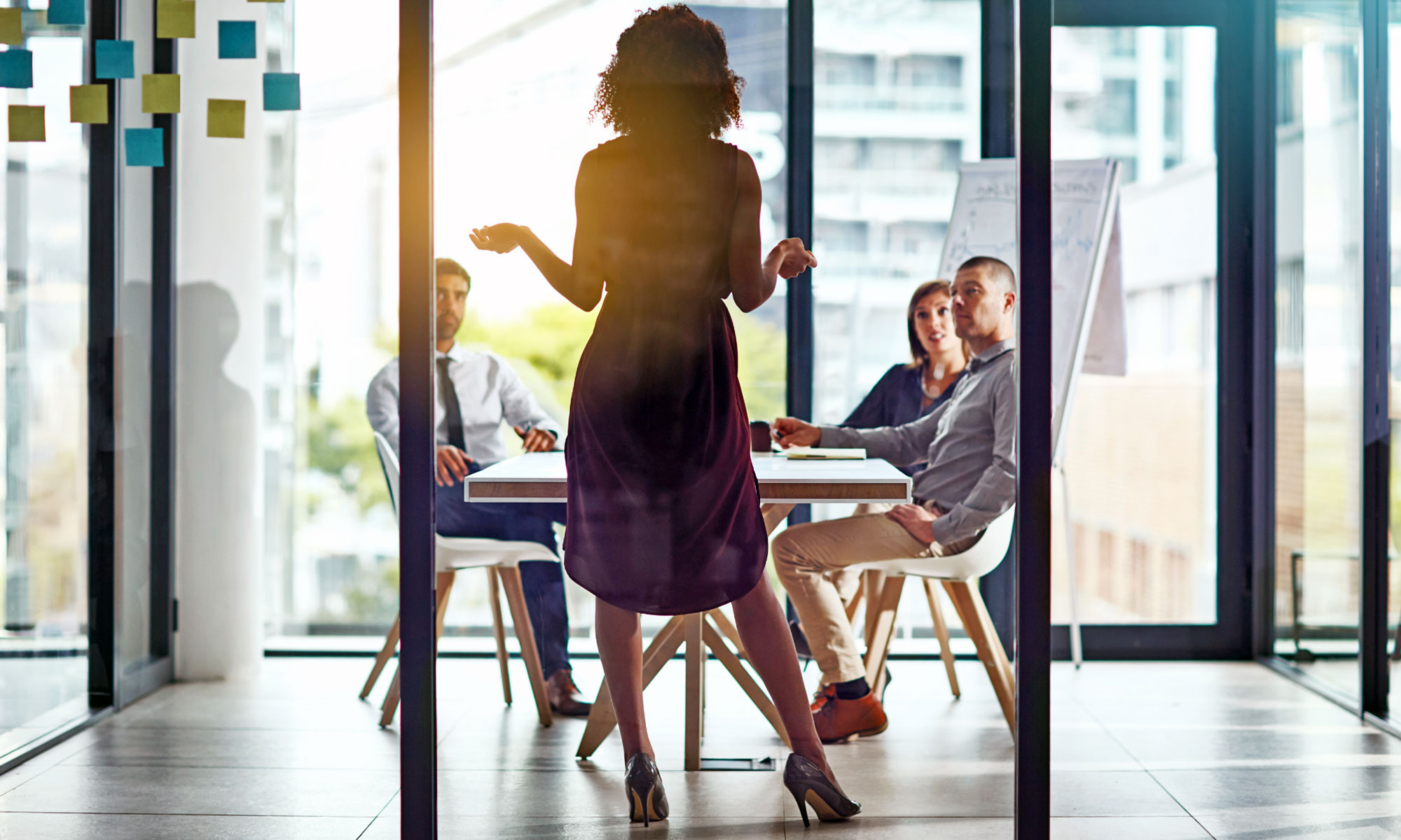 A lady leading a team in an office